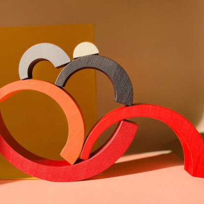 Asymmetrical Arches Stacker